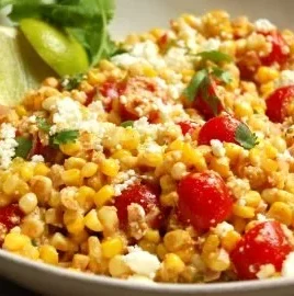 Delicious Elote Salad made with Mexican street corn, fresh herbs, and creamy dressing