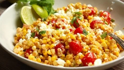 Delicious Elote Salad made with Mexican street corn, fresh herbs, and creamy dressing