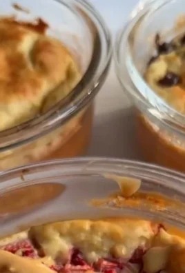 Fluffy baked protein pancake bowls topped with fruits and syrup