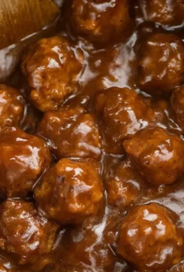 Delicious slow cooker Salisbury steak meatballs served with creamy gravy